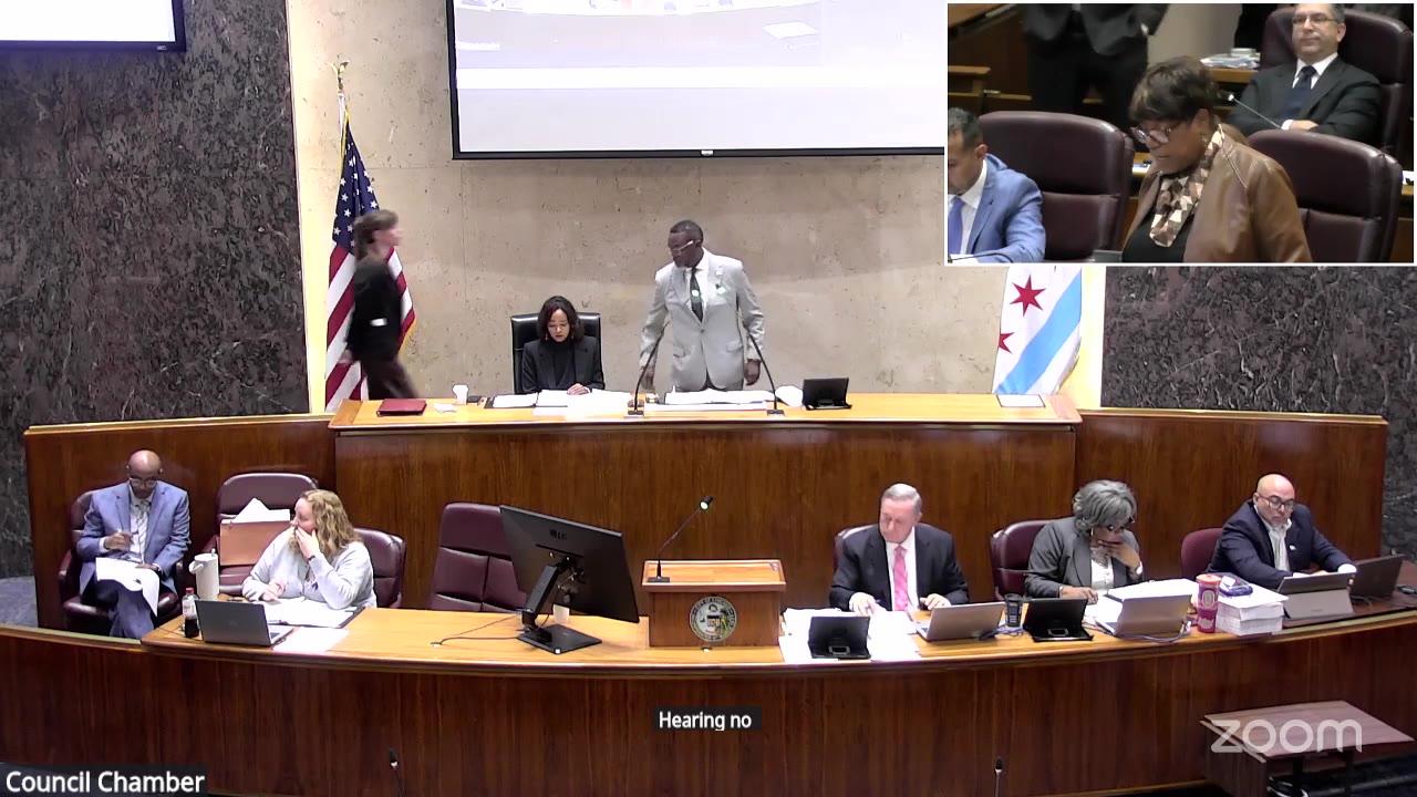 Ald. Pat Dowell (3rd Ward), inset, reads the Guevara settlement order to the City Council, Oct. 14, 2026